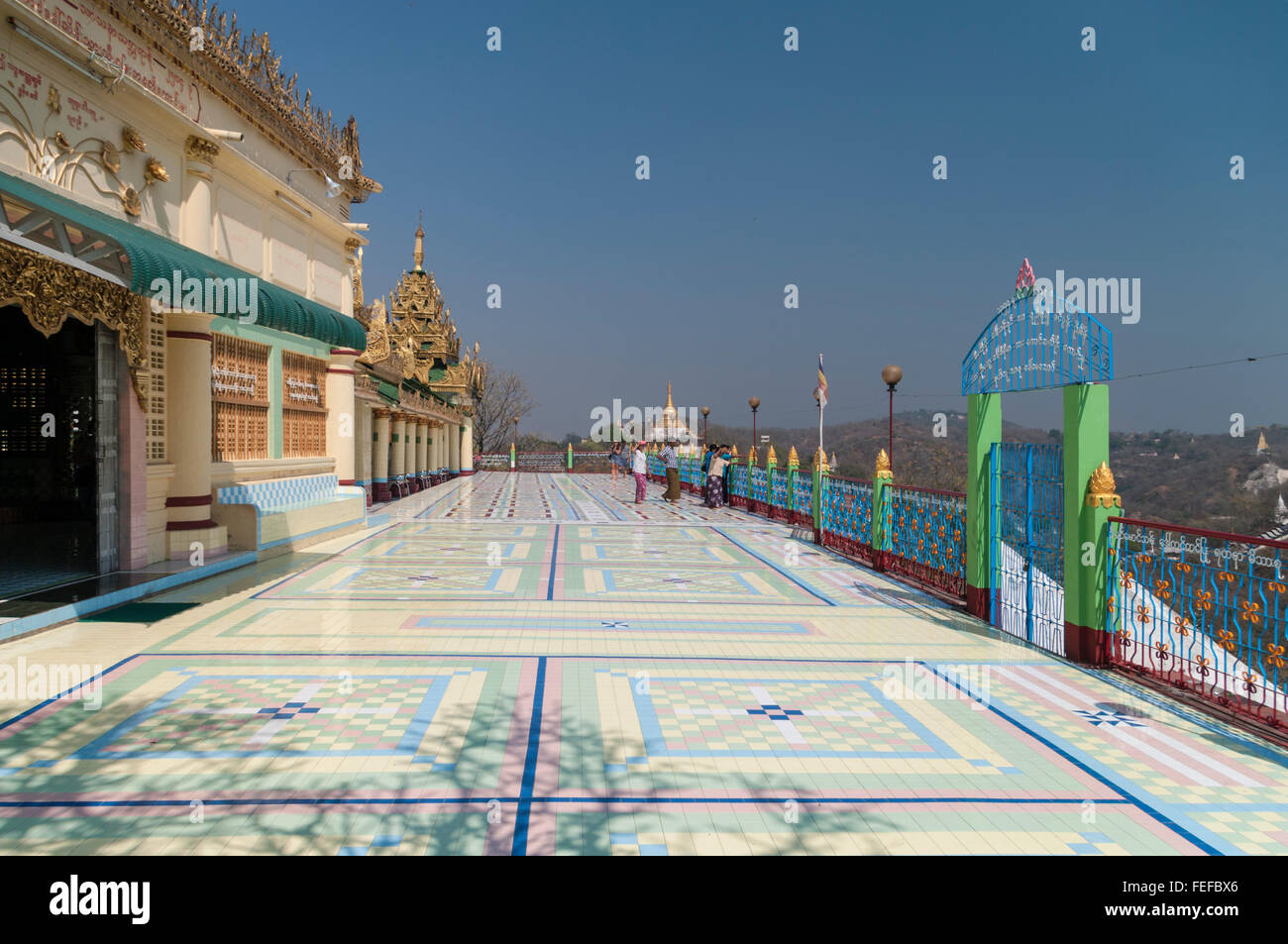 Terrace with colourful floor tiles. Soon Oo Ponya Shin Pagoda, Sagaing, Myanmar. Stock Photo