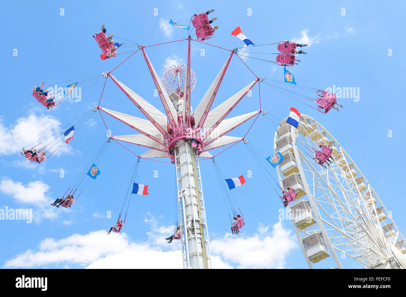 Paris, France - July 9, 2015: Tourists have fun in ferris wheel in ...