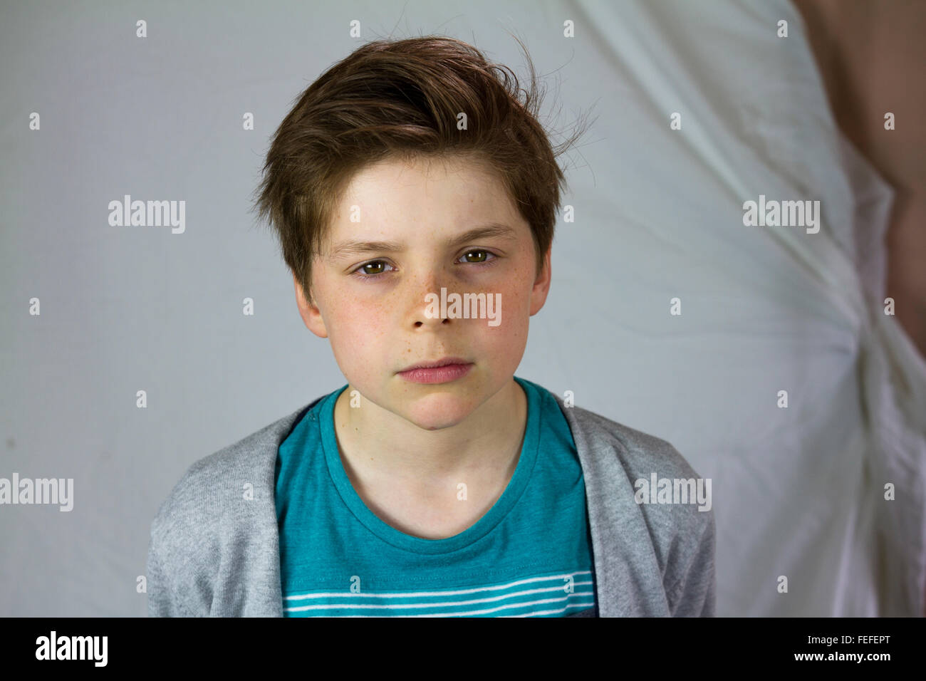 10 year old boy looking sad, child Stock Photo