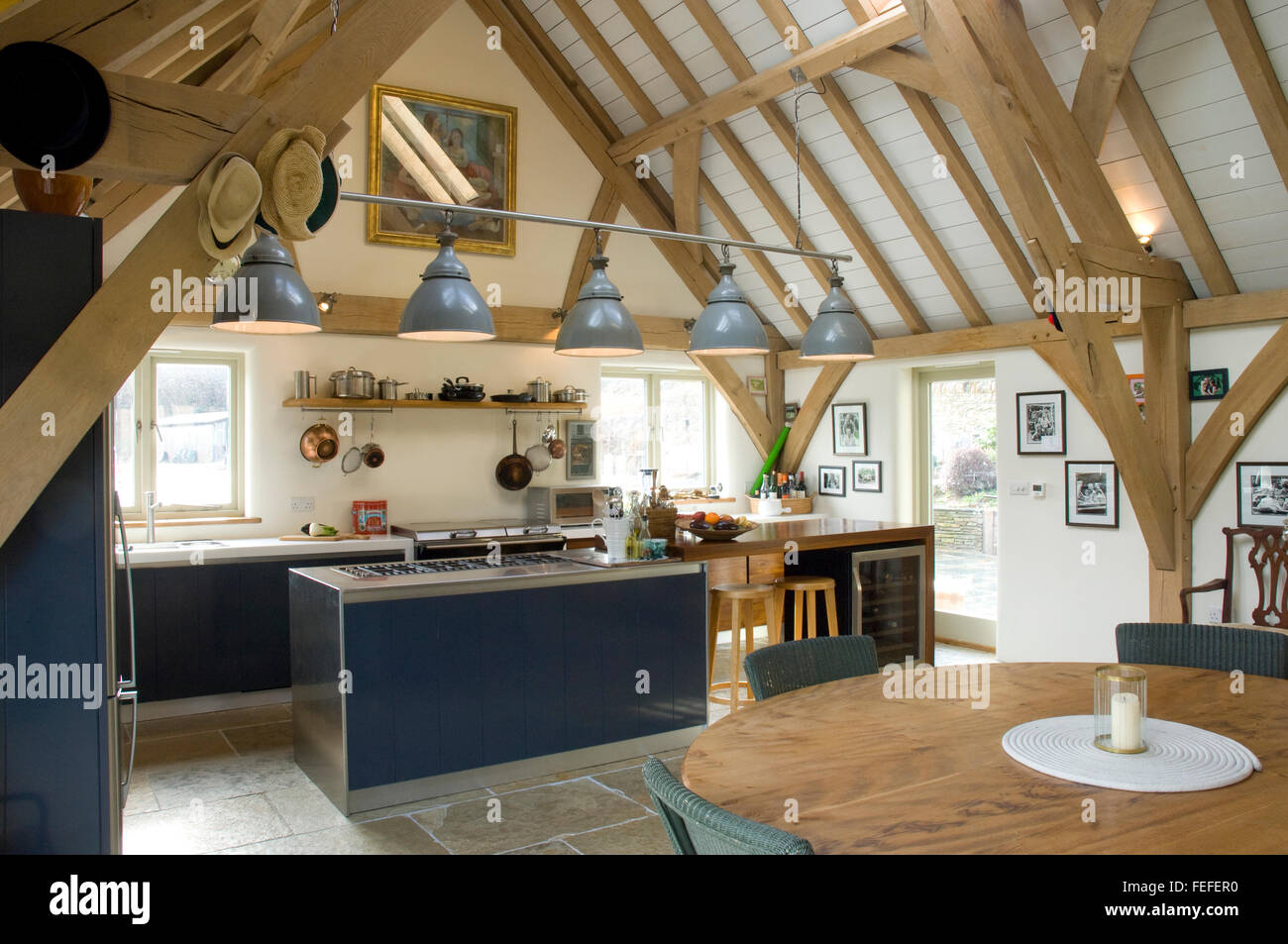 contemporary kitchen with vaulted oak beams. Stock Photo