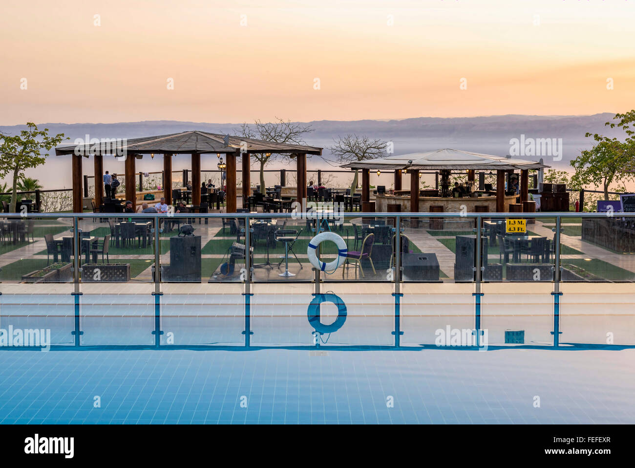 Sweimeh, Jordan - April 07, 2015: View of Holiday Inn Resort Dead Sea swimming pool. Stock Photo