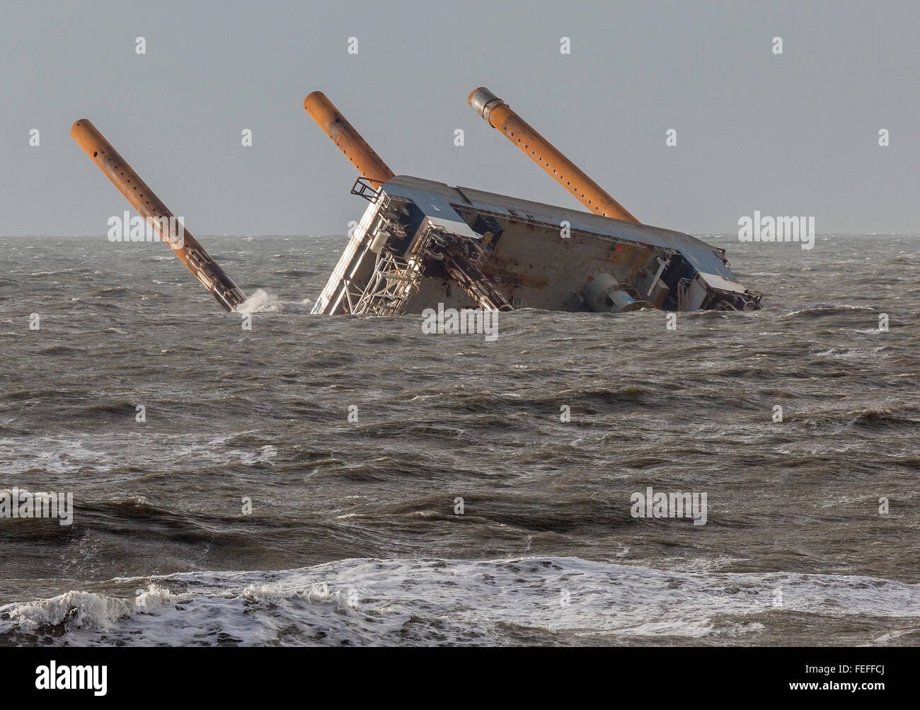 The capsized offshore wind installation and service rig off Nymindegab, Denmark Stock Photo