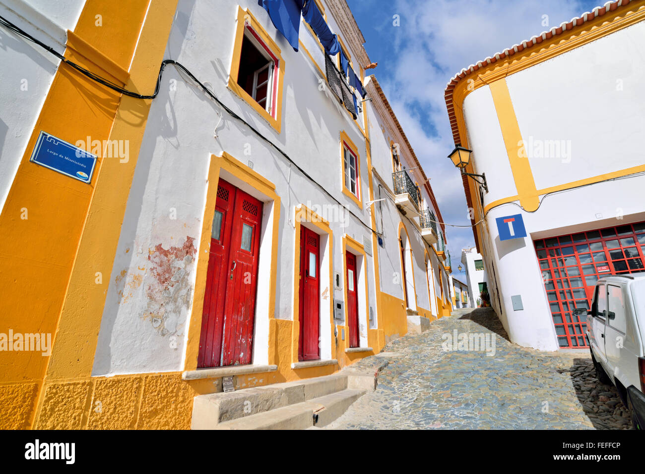 Portugal, Alentejo: Typical alley and traditional buildings in the historic village Mértola Stock Photo