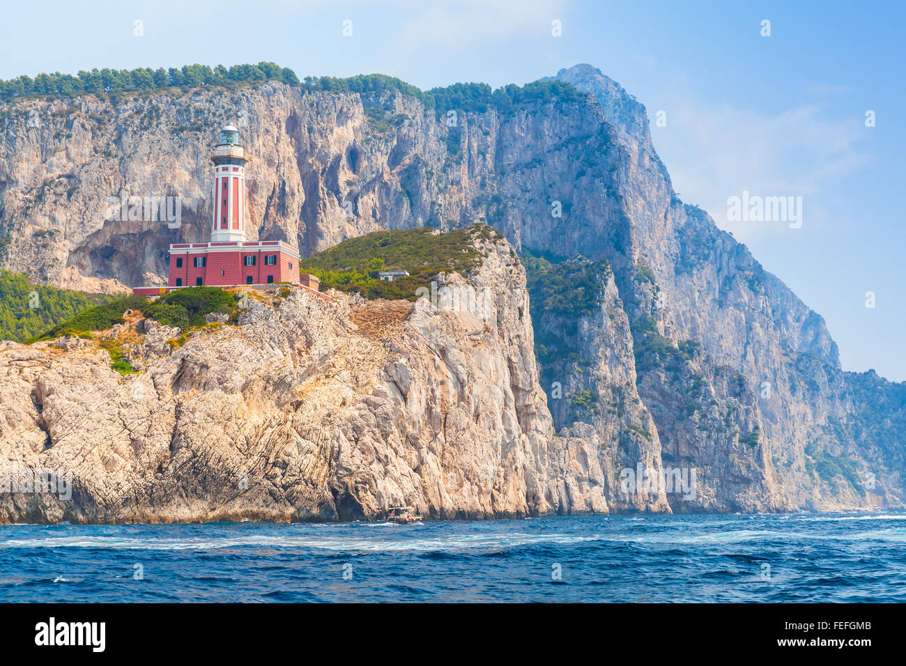 Punta Carena. Lighthouse stands on the rocky coast of Capri island, Italy Stock Photo