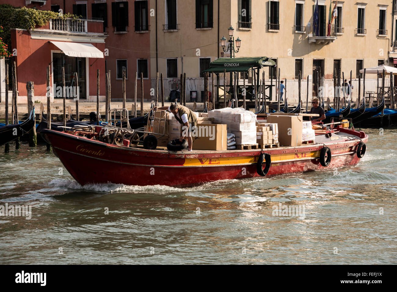 Goods being carried on a barge on the Grand Canal in Venice, Italy