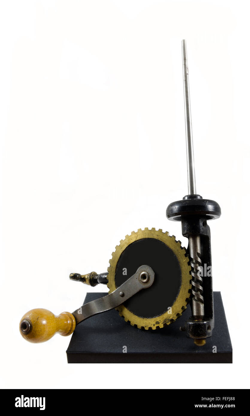 Old spool machine with a crank and a gear Stock Photo - Alamy