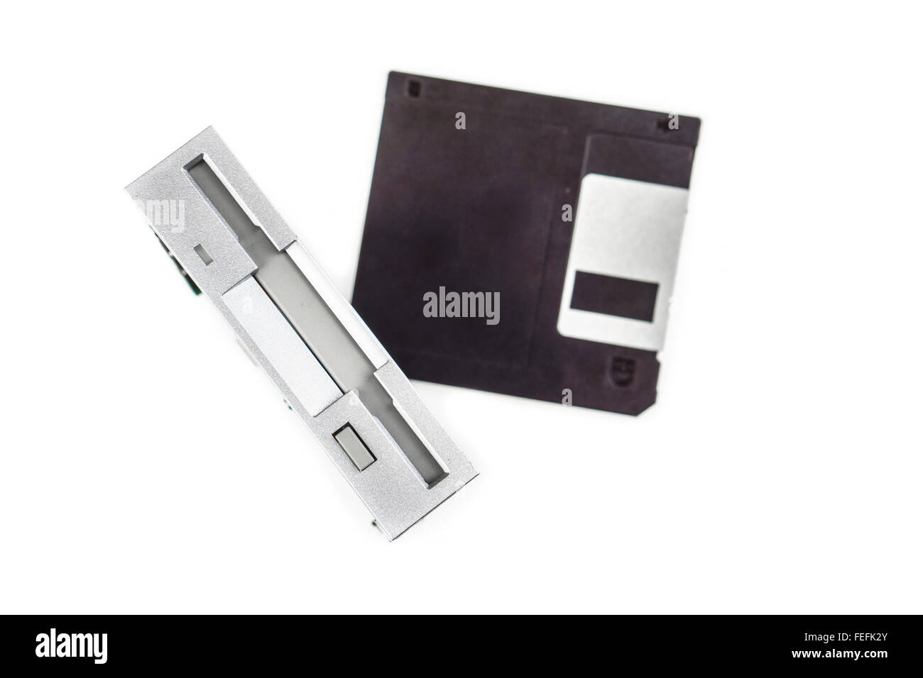 Floppy disk drive and diskette, white isolated 02 Stock Photo