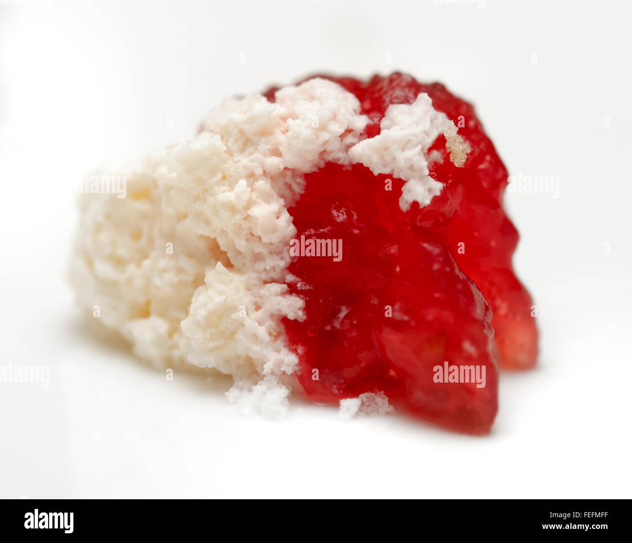 A blob of fresh cream and strawberry jam Stock Photo
