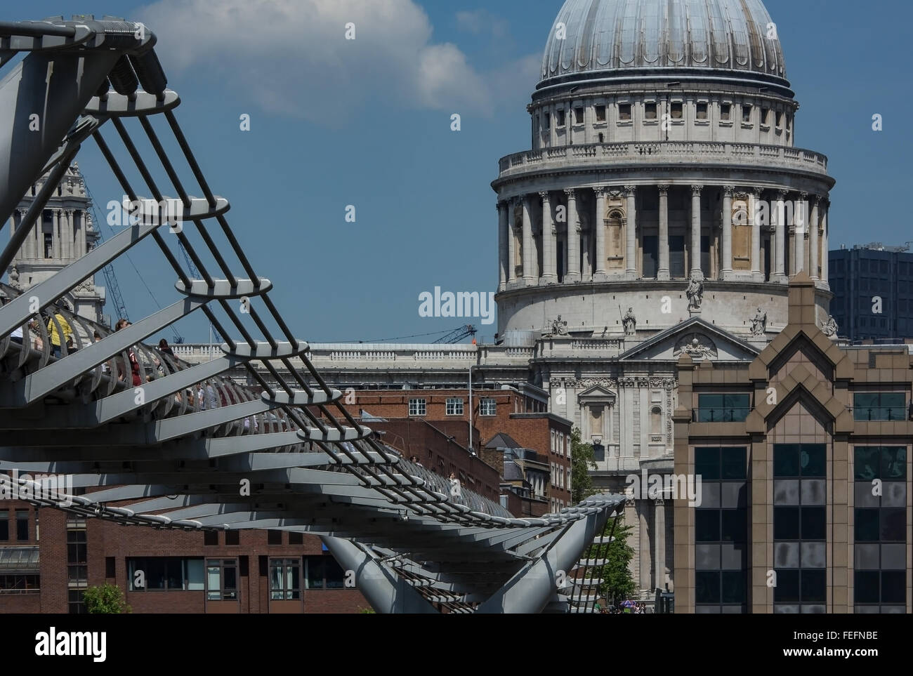 View of St Paul's Cathedral, London featuring the Millenium Bridge Stock Photo