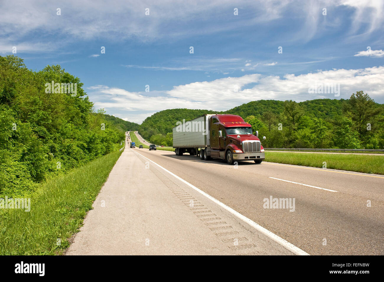 Burgundy Semi Truck On Beautiful Spring Day Stock Photo - Alamy