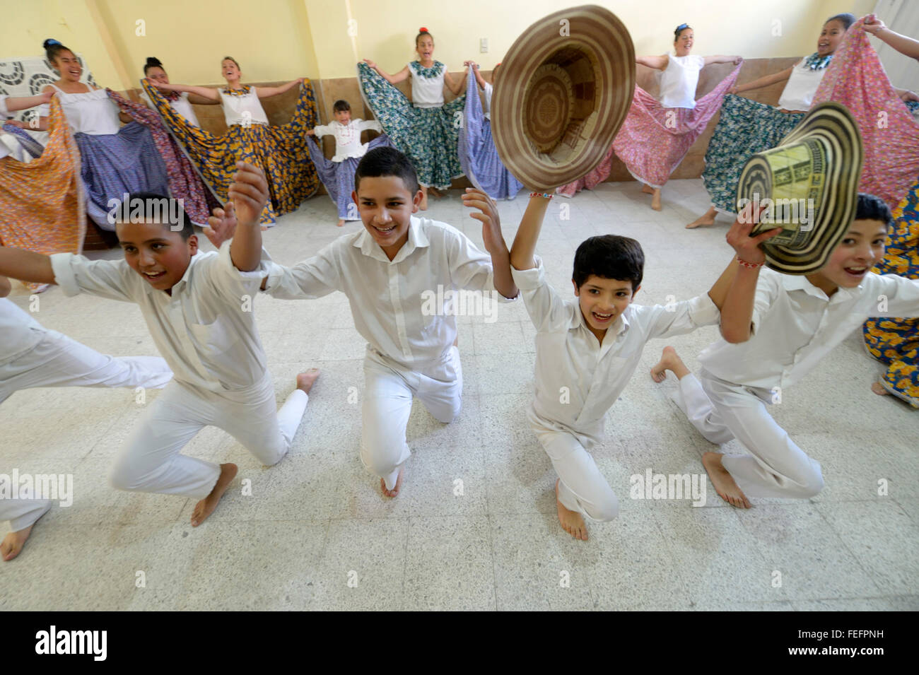 Boys taking bow with straw hats, dance group, folk dance, traditional dance, Barrio San Martín, Bogotá, Colombia Stock Photo