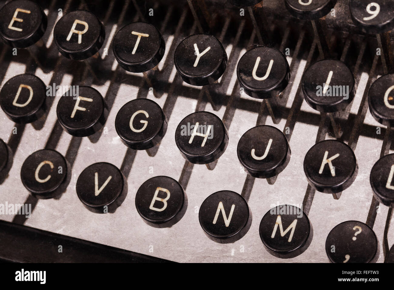 Old typewriter keyboard - Vintage image, noise and scratches Stock Photo