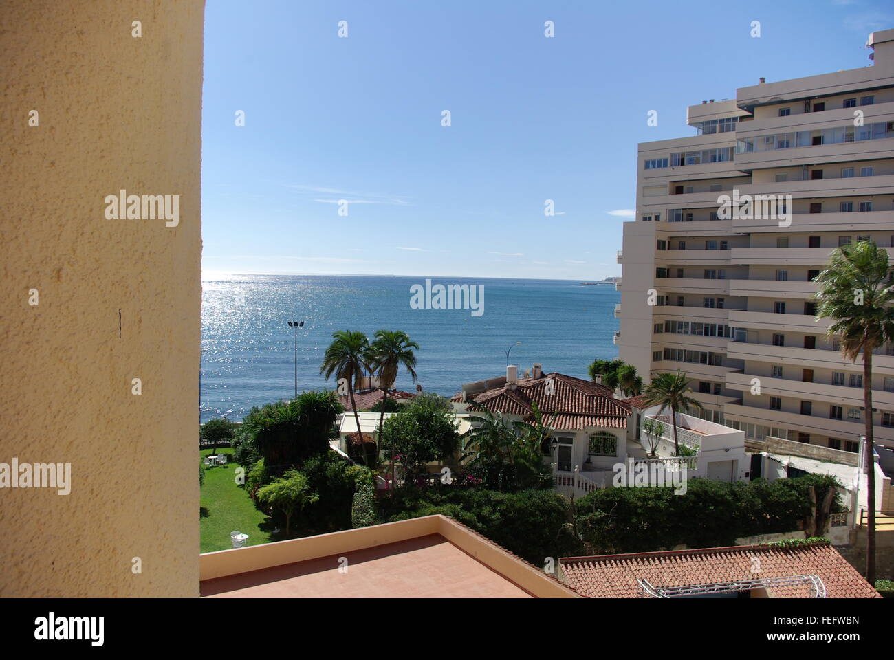 Mediterranean Sea between hotels, Fuengirola, Malaga,  Costa del Sol,  Spain Stock Photo