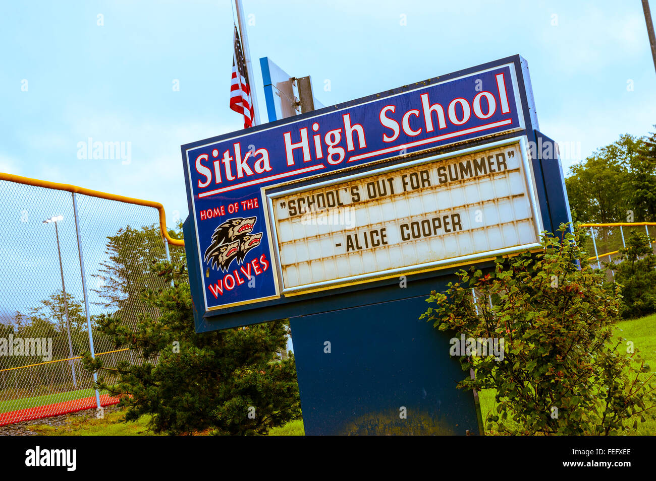 Sitka High School sign with Alice Cooper quote, "School's Out for