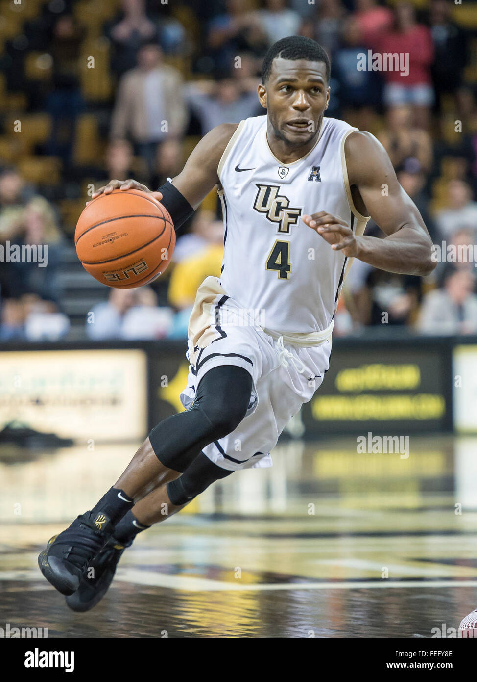 Orlando, FL, USA. 6th Feb, 2016. UCF guard Daiquan Walker (4) drives to the basket during 2nd half mens NCAA basketball game action between the Temple Owls and the UCF Knights. Temple defeated UCF 62-60 at CFE Arena in Orlando, Fl. Romeo T Guzman/CSM/Alamy Live News Stock Photo