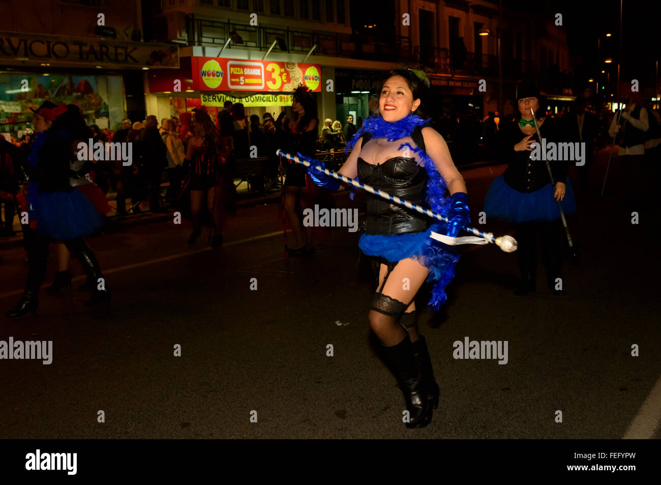 Madrid, Spain 6th February 2016. A female performer in a blue and black costume from the Asociación Gruñidos Salvajes. The carnival parade in Madrid, Gran Pasacalles del Carnaval (The Grand Carnival Parade), was held in the district of Tetuán Madrid, Spain.  Credit:  Lawrence JC Baron/Alamy Live News. Stock Photo