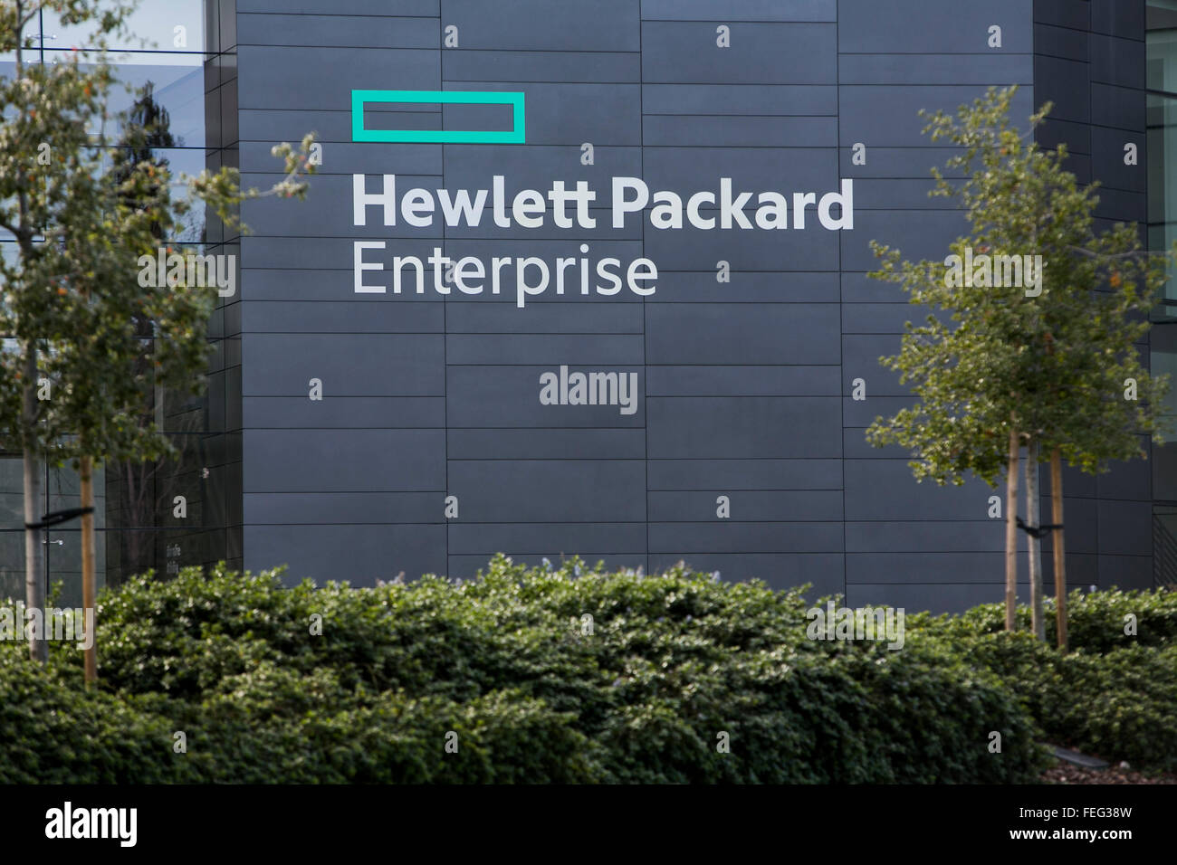 A logo sign outside of the headquarters of Hewlett Packard Enterprise