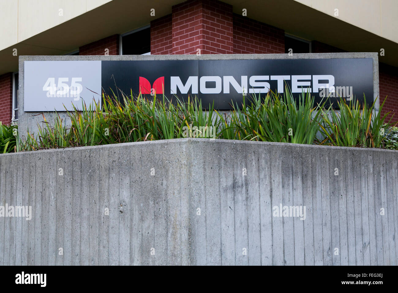 A logo sign outside of the headquarters of Monster Inc., in Brisbane, California on January 24, 2016. Stock Photo