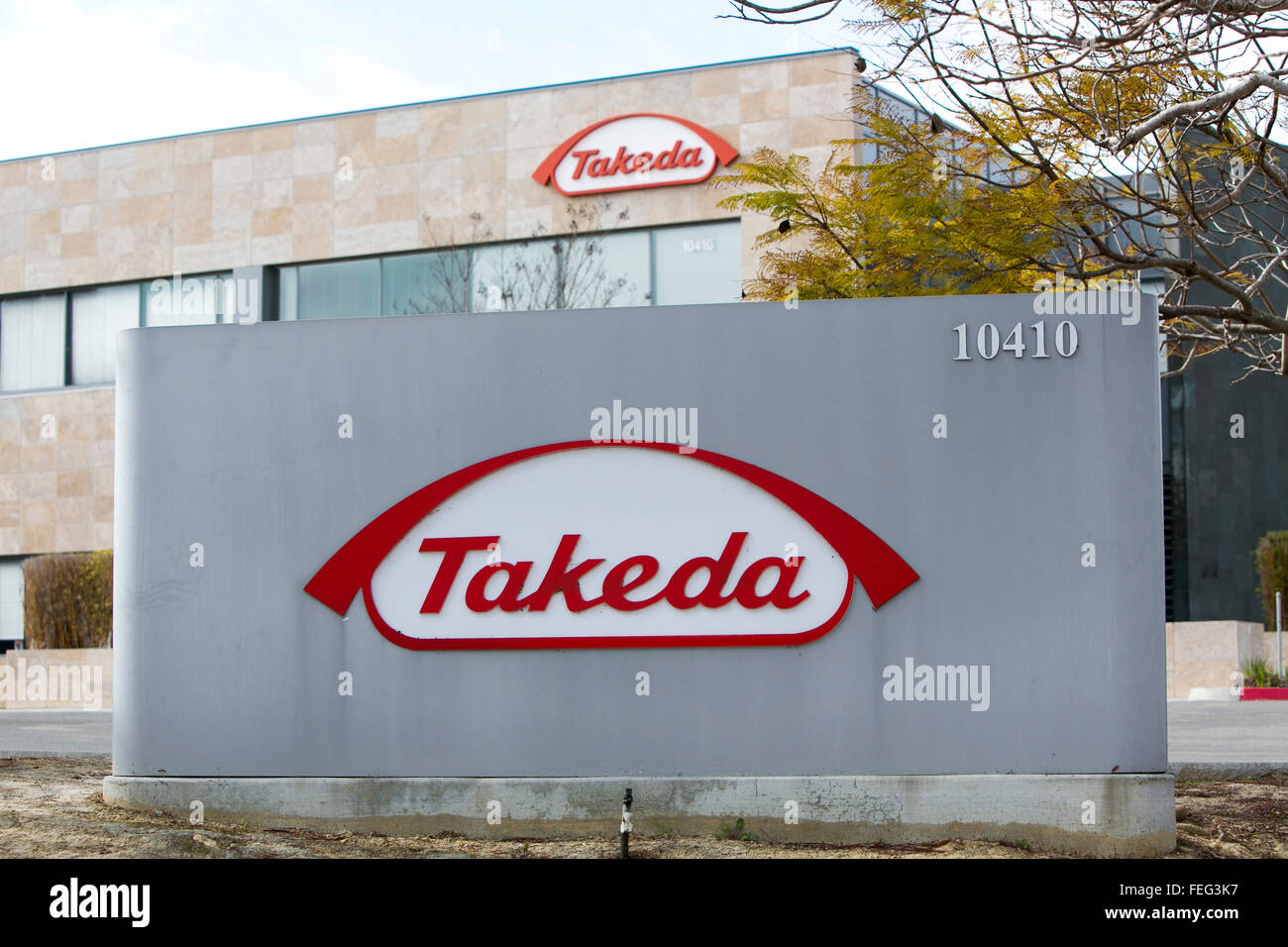 A logo sign outside of a facility occupied by the Takeda Pharmaceutical