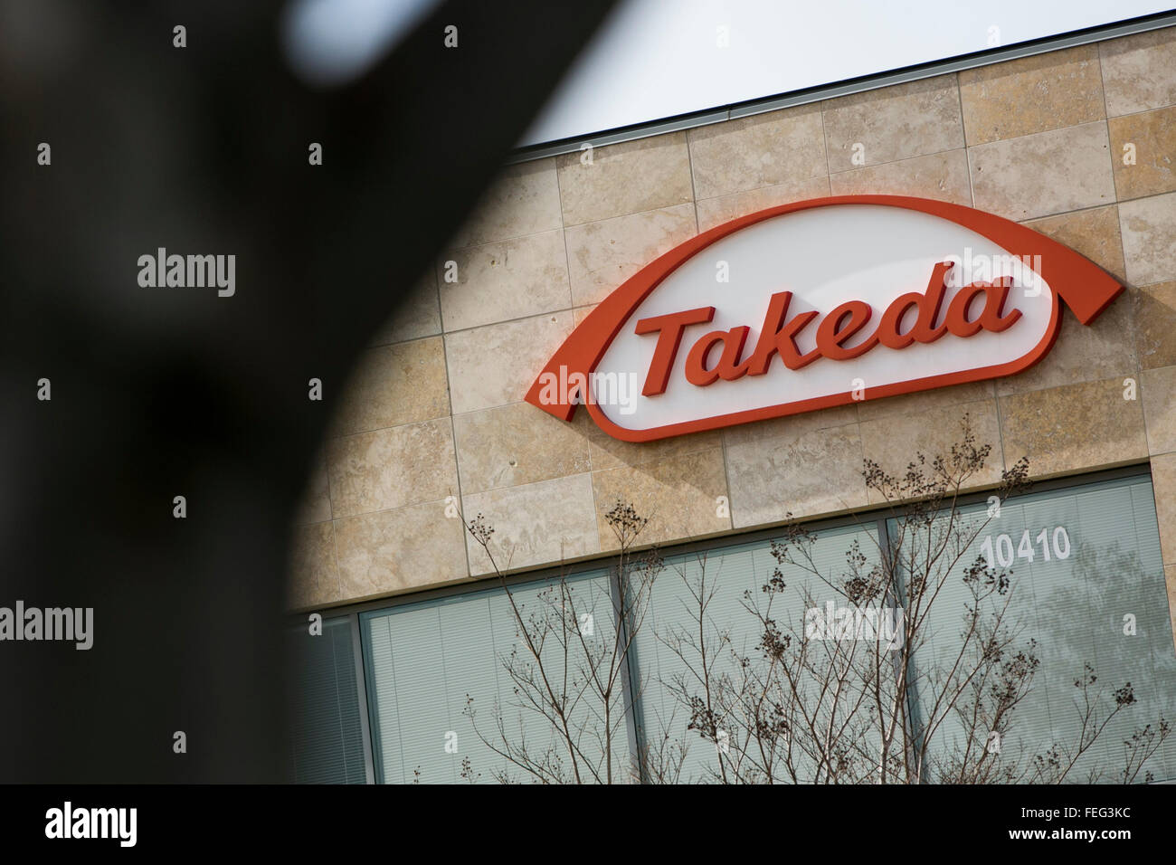 A logo sign outside of a facility occupied by the Takeda Pharmaceutical
