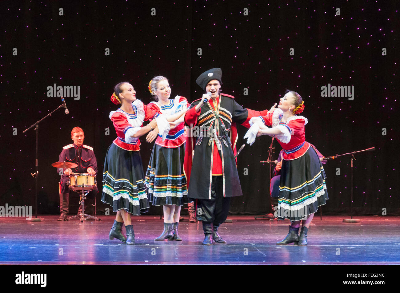 Russian folk dancers performing in The Pacifica Theatre, Royal Caribbean's Brilliance of the Seas cruise ship, North Sea, Europe Stock Photo