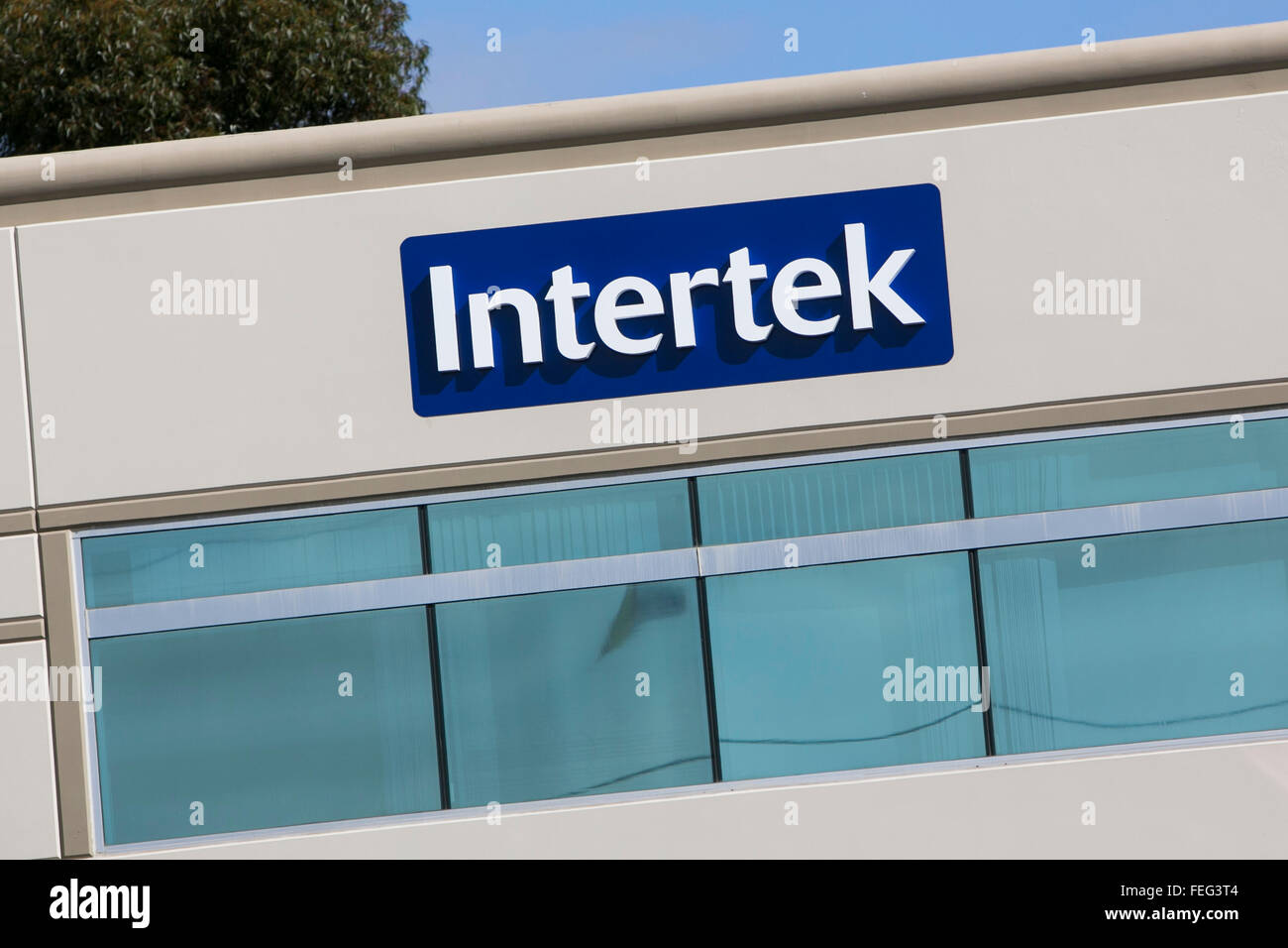 A logo sign outside of a facility occupied by the Intertek Group in San ...