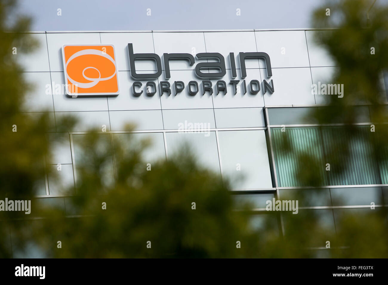 A logo sign outside of the headquarters of the Brain Corporation in San Diego, California on January 30, 2016. Stock Photo