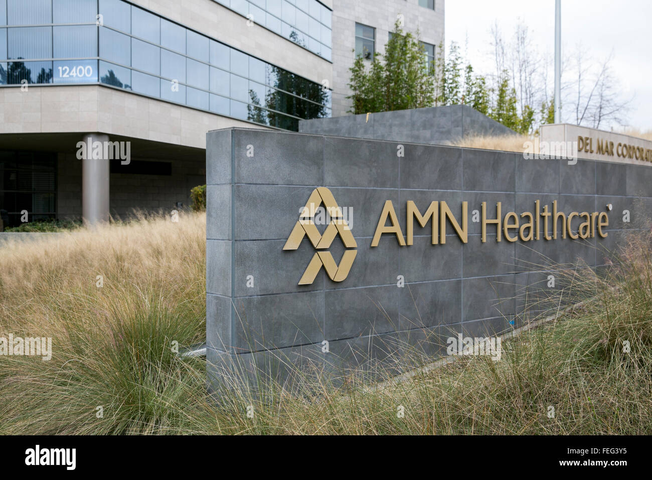 A logo sign outside of the headquarters of AMN Healthcare in San Diego, California on January 30, 2016. Stock Photo