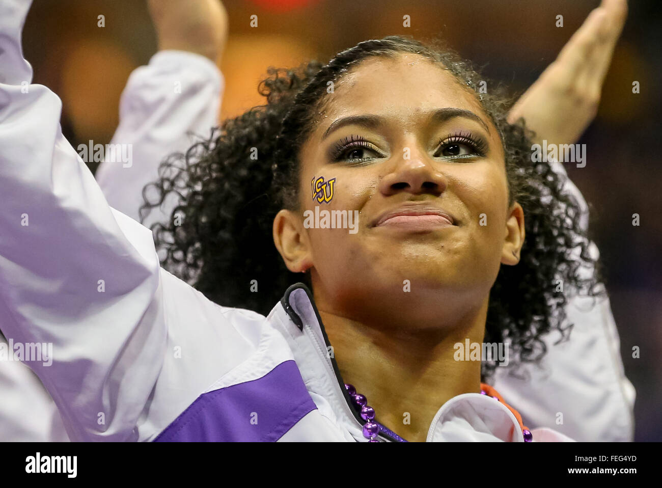 Baton Rouge, LA, USA. 05th Feb, 2016. LSU Tigers Randii Wyrick raises her hands to the fans after winning the meet after a NCAA gymnastics meet between the Arkansas Razorbacks at LSU Tigers at the Pete Maravich Assembly Center in Baton Rouge, LA. Stephen Lew/CSM/Alamy Live News Stock Photo