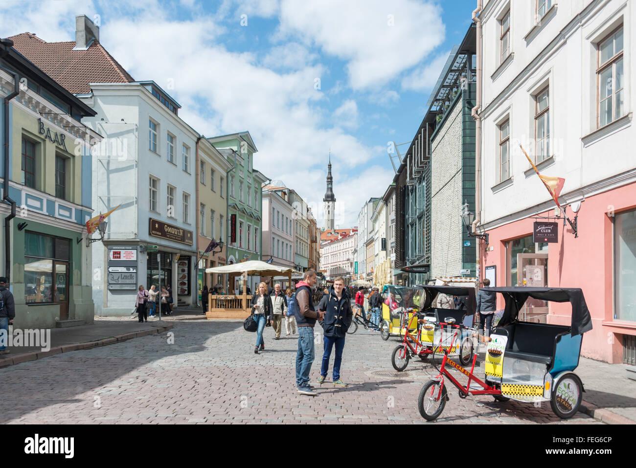 Cobbled Viru Street showing bicycle EcoCabs, Old Town, Tallinn, Harju County, Republic of Estonia Stock Photo