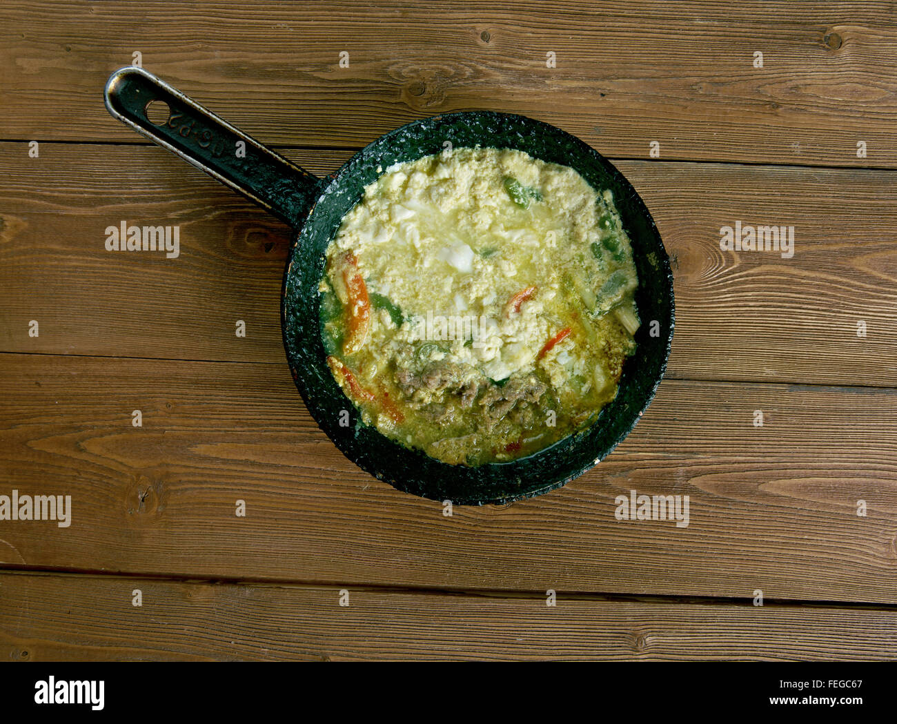 Saltah national dish of Yemen.meat stew called maraq, a dollop of