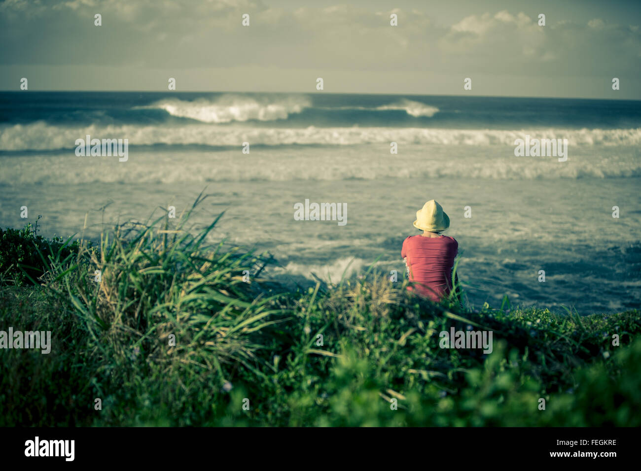 Woman watching waves hi-res stock photography and images - Alamy