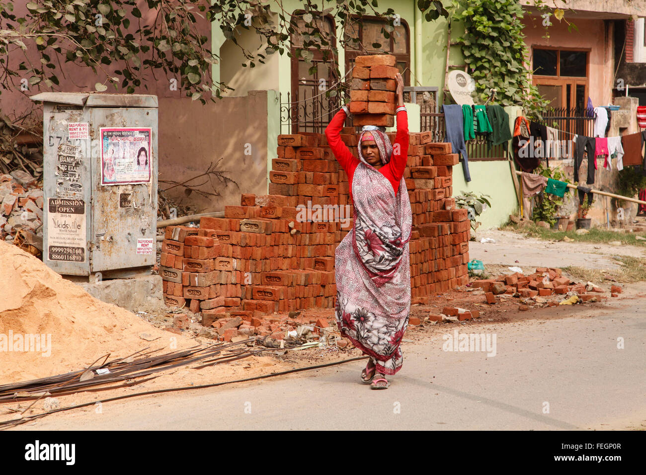 India's illiterate women working as laborers using their hands. Stock Photo