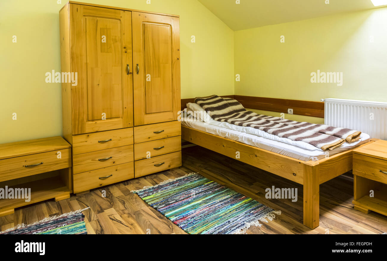Clean Hostel Room With Bed And Wardrobe Stock Photo 95025885 Alamy