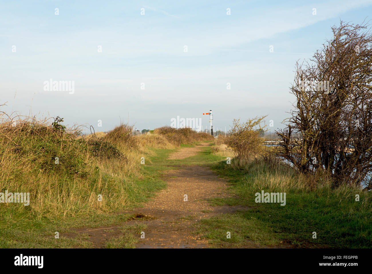 Public footpath leading to the new railway signal along the disused Hayling Billy line. Stock Photo