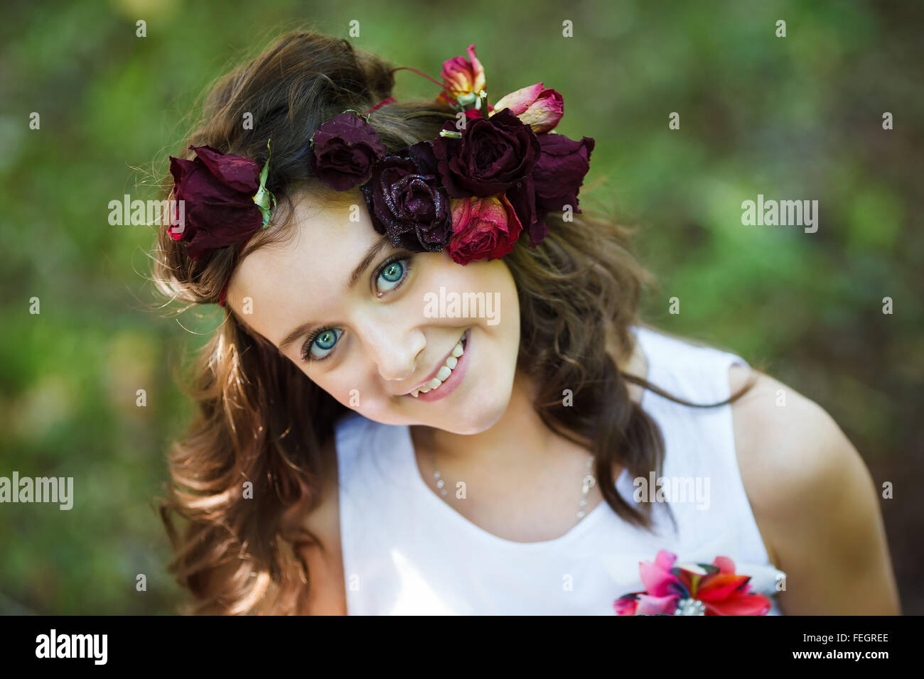 Portrait of young beautiful girl in a park at summer time Stock Photo ...