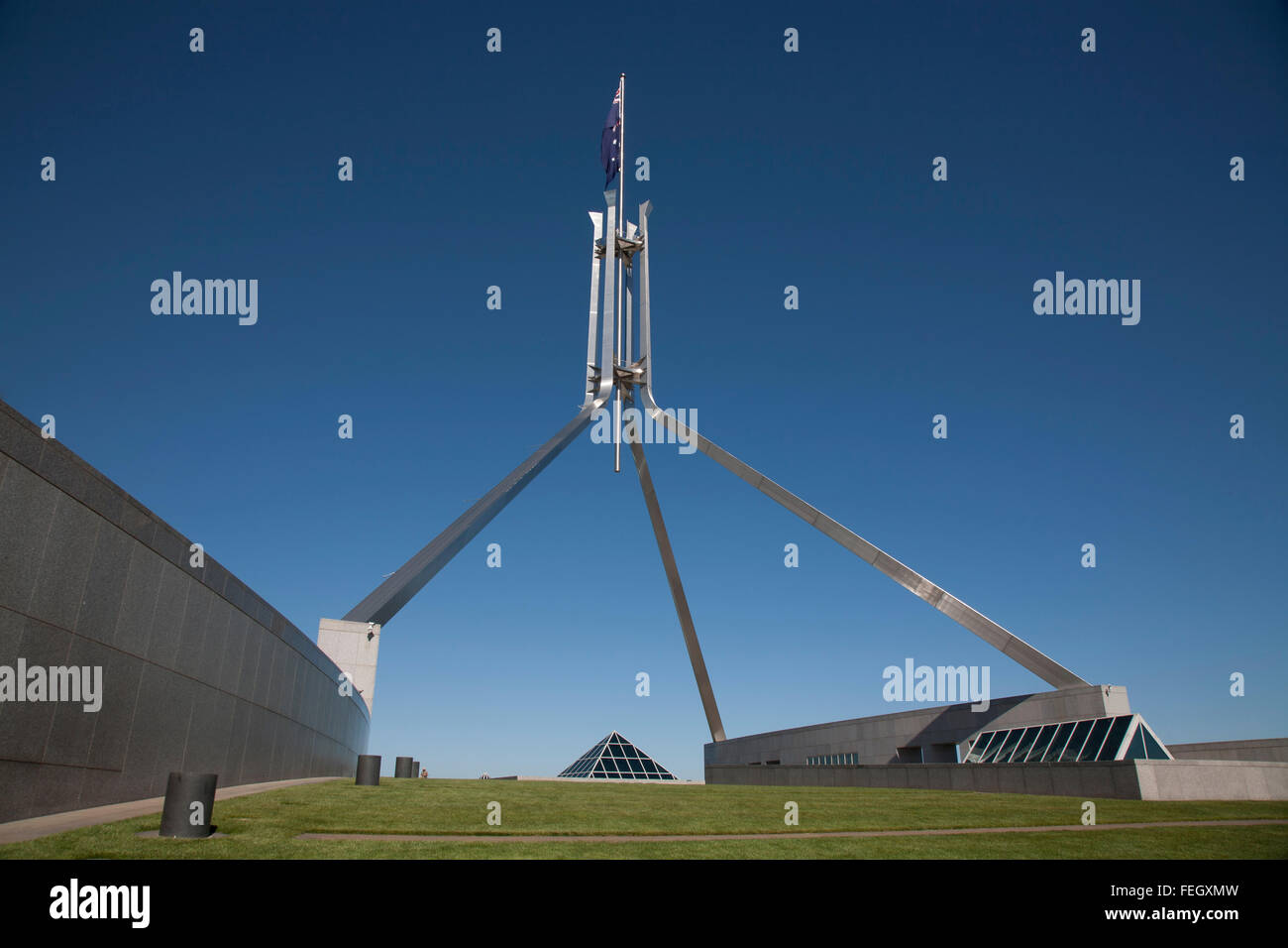 The flagpole which flies the Australian Flag at Federal Parliament House Capital Hill Canberra ACT Australia Stock Photo