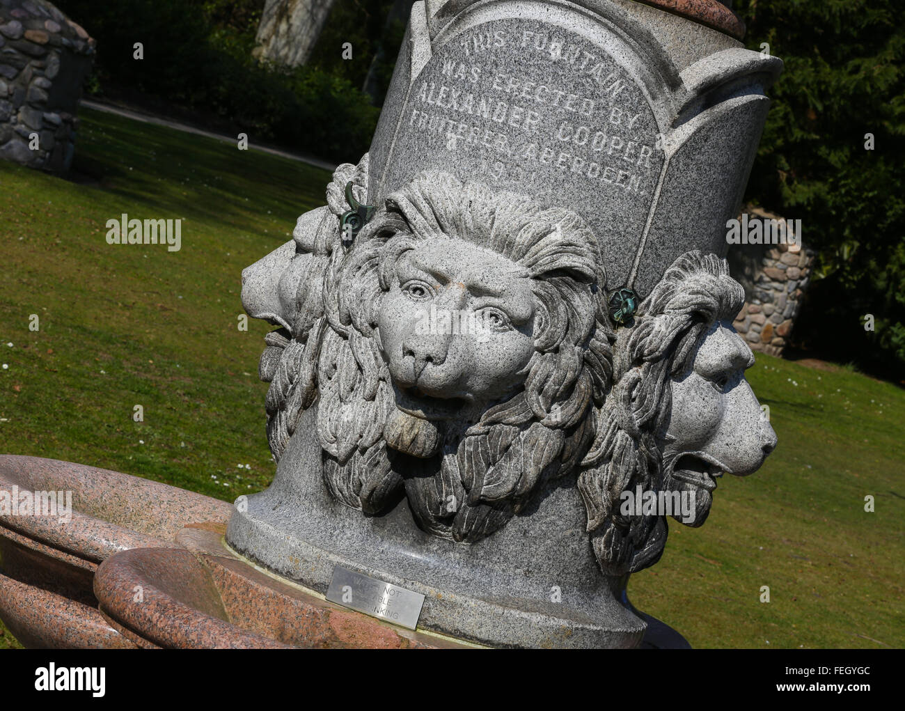 Lions Head sculpted water fountain in Hazelhead Park in Aberdeen city, Scotland, UK Stock Photo