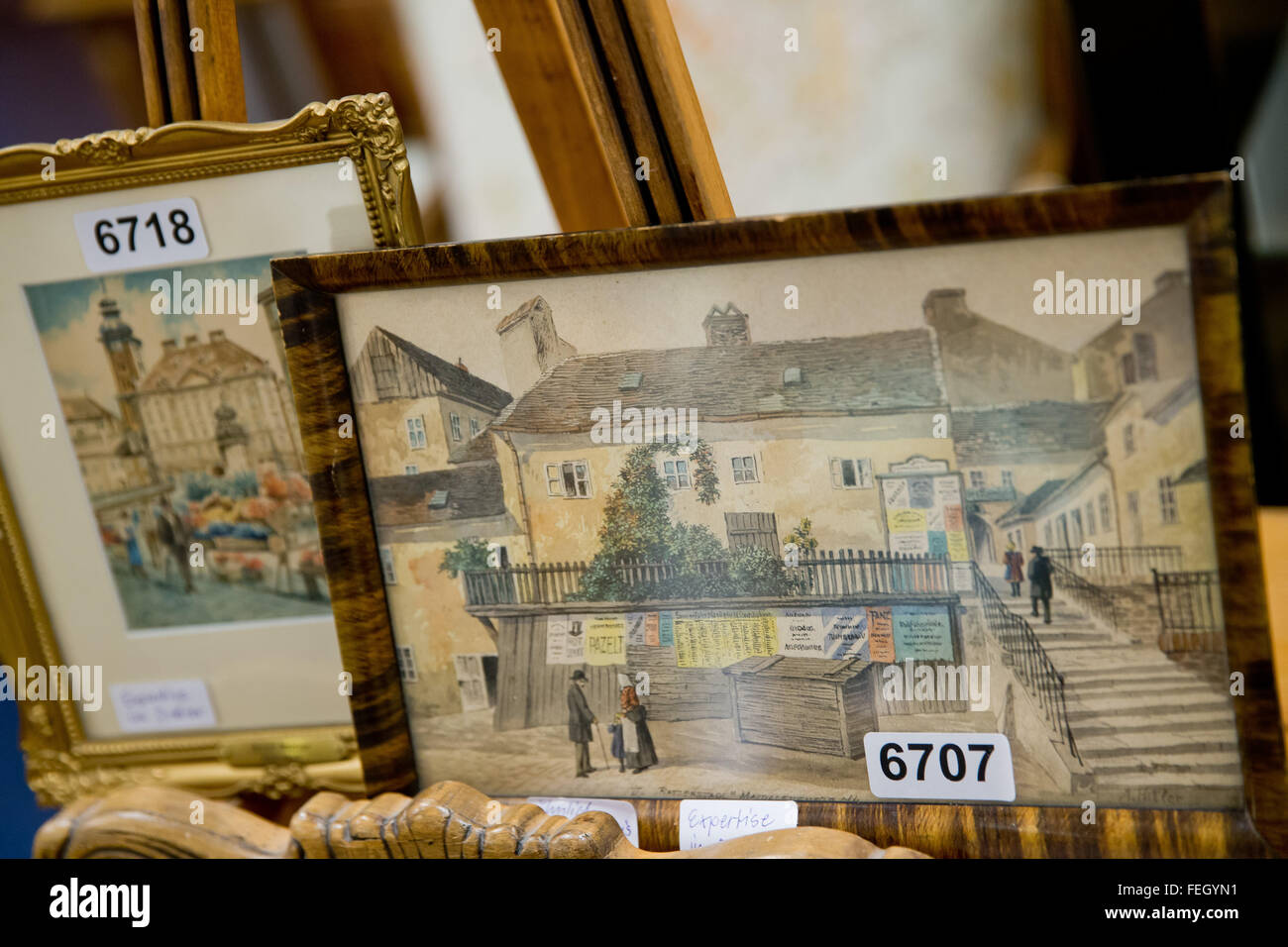 Nuremberg, Germany. 4th Feb, 2016. The water colour paintings 'Freyung Wien' (l) and 'VI. Ratzenstadl Magdalenenstr. 74', which are both attributed to Adolf Hitler as author, are presented at an auctioneer in Nuremberg, Germany, 4 February 2016. A total of 29 paintings and drawings, attributed to Adolf Hitler, have been auctioned off at Weidler actioneers in Nuremberg on 6 February 2016. Photo: Daniel Karmann/dpa/Alamy Live News Stock Photo