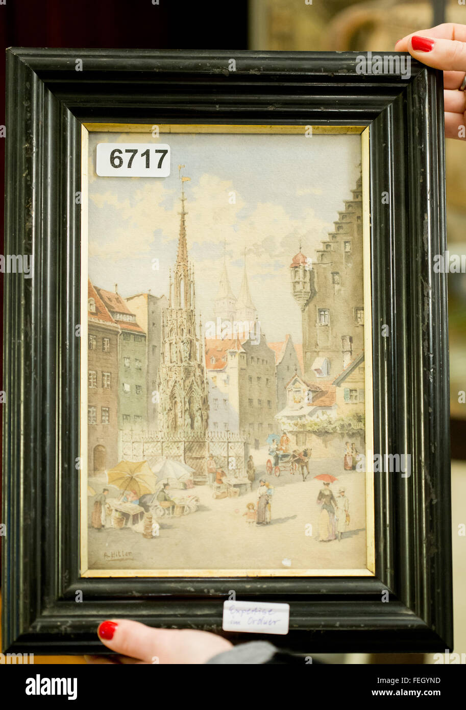 Nuremberg, Germany. 4th Feb, 2016. The water colour painting 'Nuernberg Schoener Brunnen', which is attributed to Adolf Hitler as author, is presented at an auctioneer in Nuremberg, Germany, 4 February 2016. A total of 29 paintings and drawings, attributed to Adolf Hitler, have been auctioned off at Weidler actioneers in Nuremberg on 6 February 2016. Photo: Daniel Karmann/dpa/Alamy Live News Stock Photo