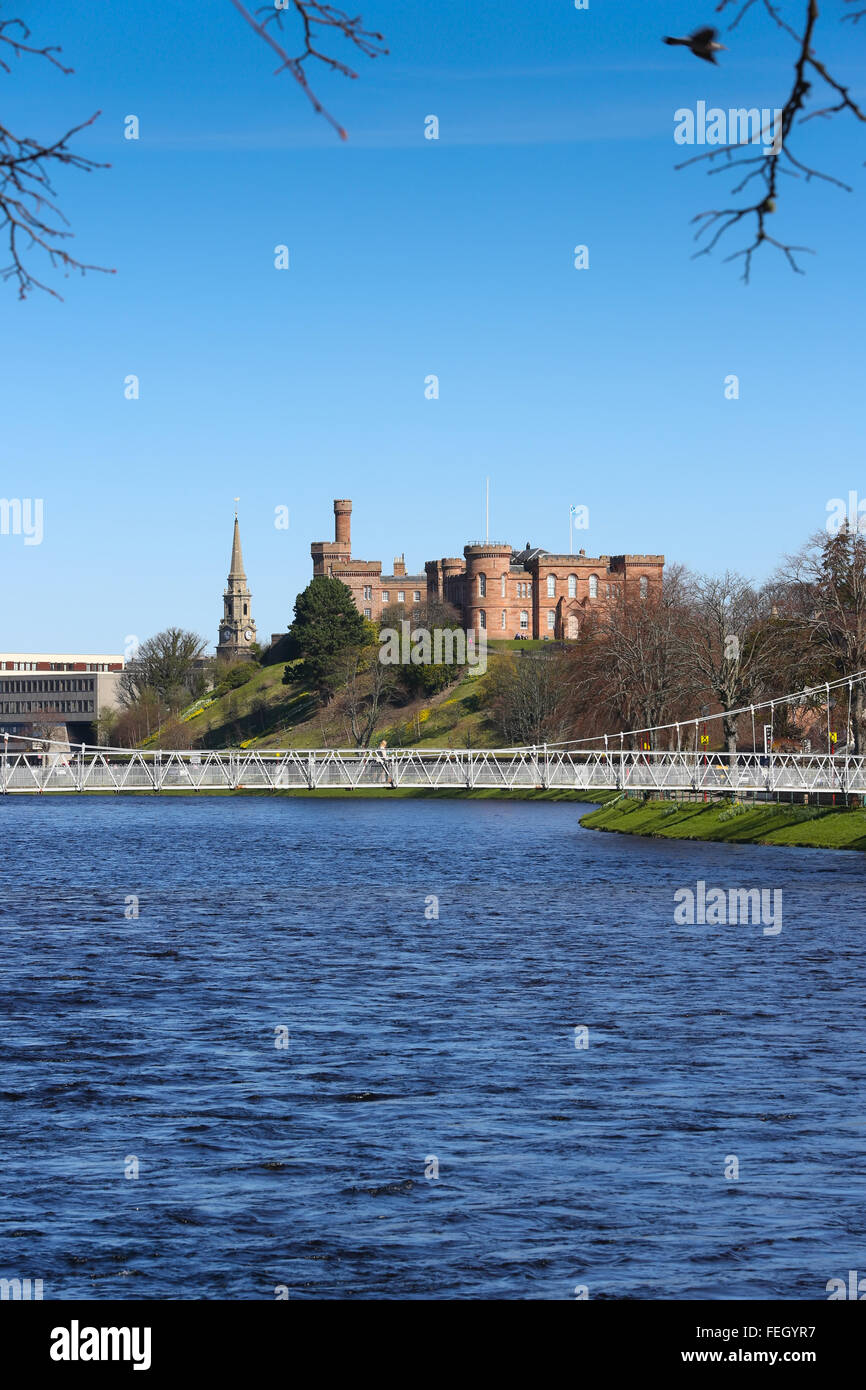 Inverness Castle and pedestrian bridge beside the River Ness in the city of Inverness in the Highlands of Scotland, UK. Stock Photo