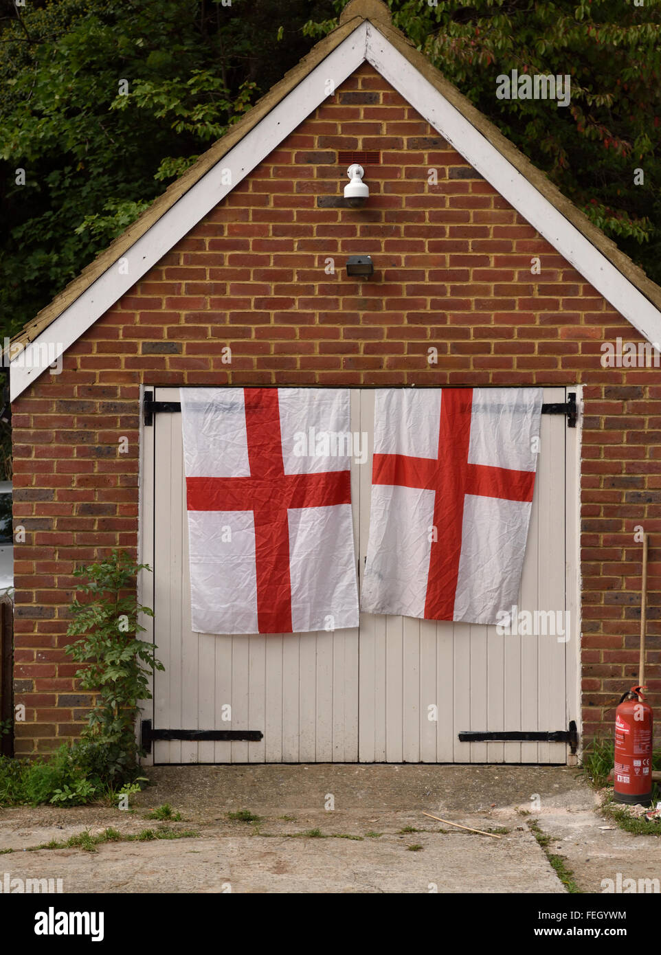 Flying the English flag on houses, garages, windows in Twickenham during the 2015 Rugby World Cup Stock Photo