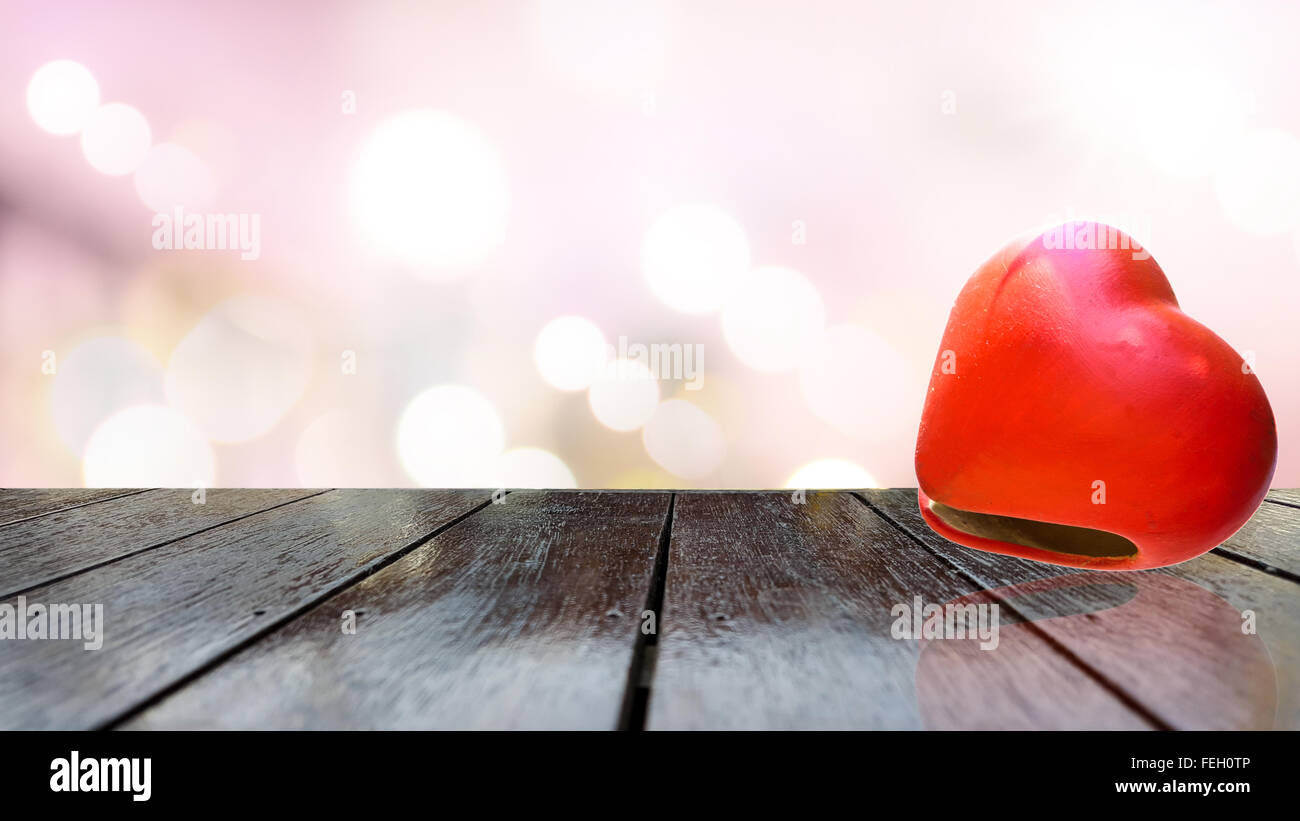 Heart shape on wooden table texture and beautiful background Stock