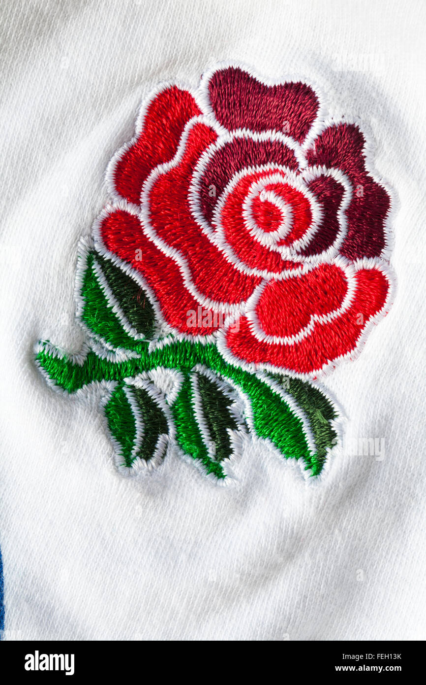 England Rugby logo - Red rose stitched logo on white England Rugby official licensed product baby grow Stock Photo