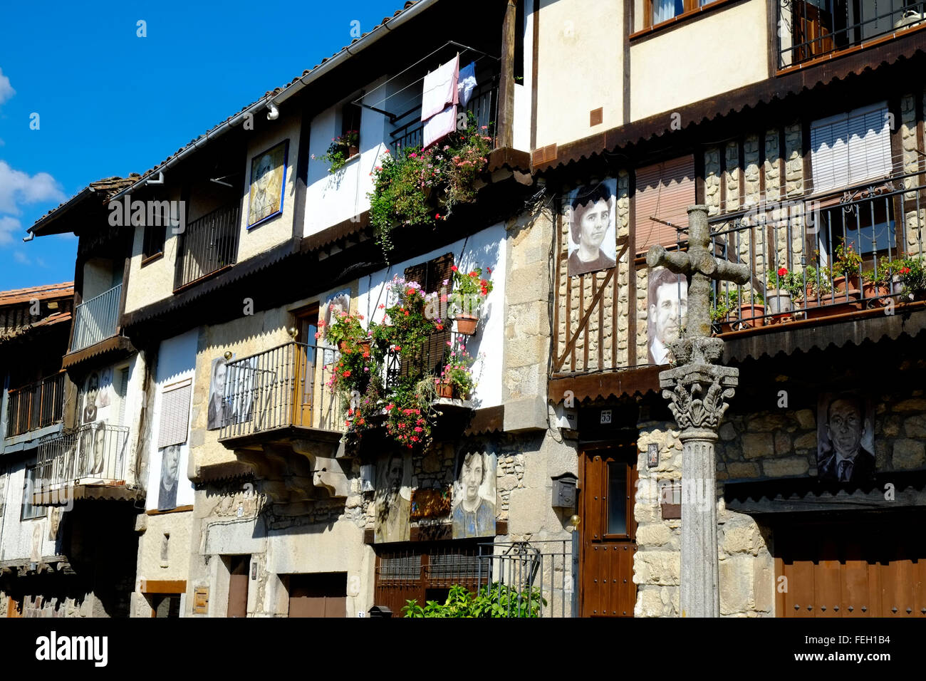 Medieval town with portraits of the inhabitants on their houses. Mogarraz, Castilla y León. Spain Stock Photo