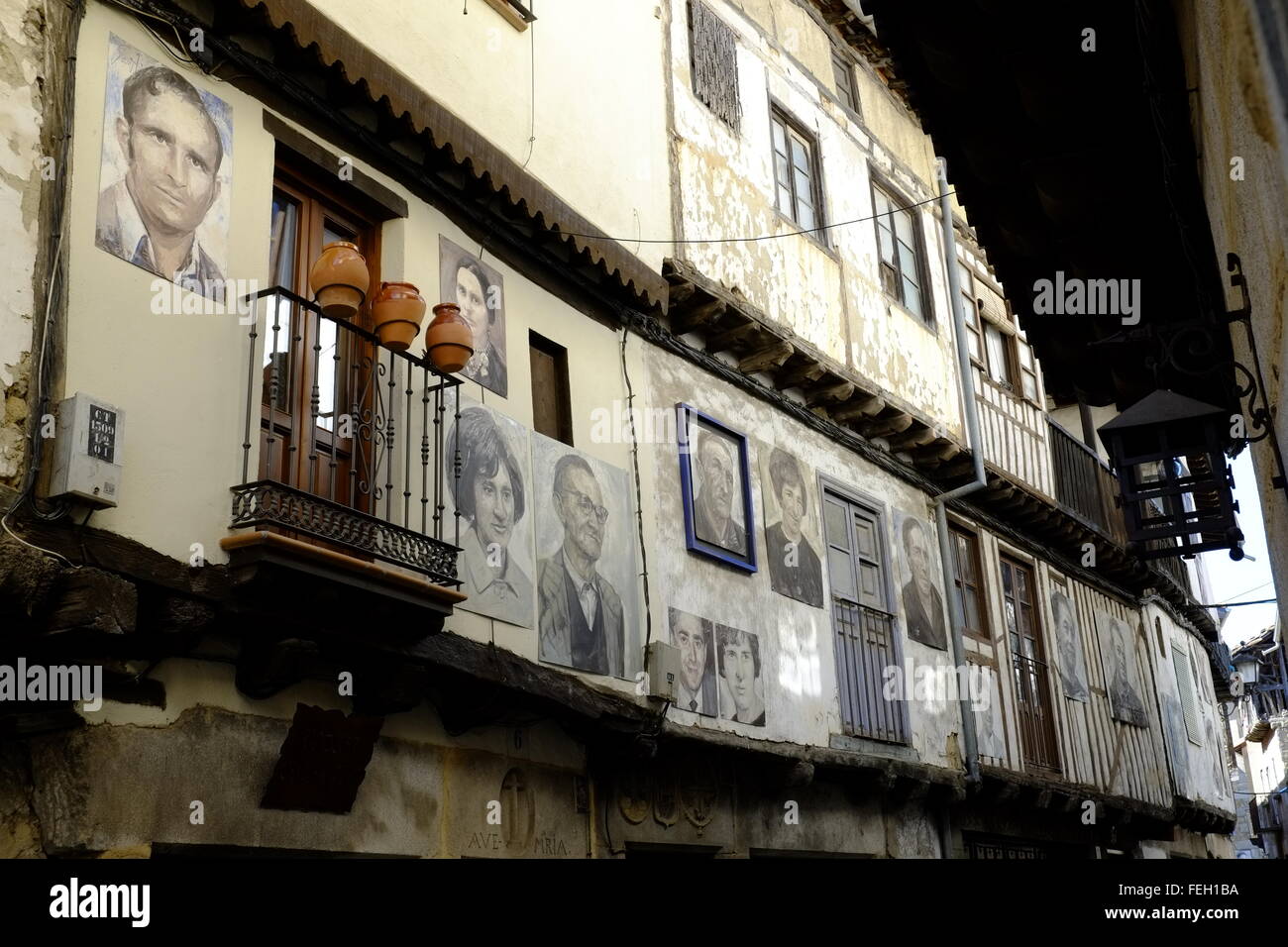 Medieval town with portraits of the inhabitants on their houses. Mogarraz, Castilla y León. Spain Stock Photo