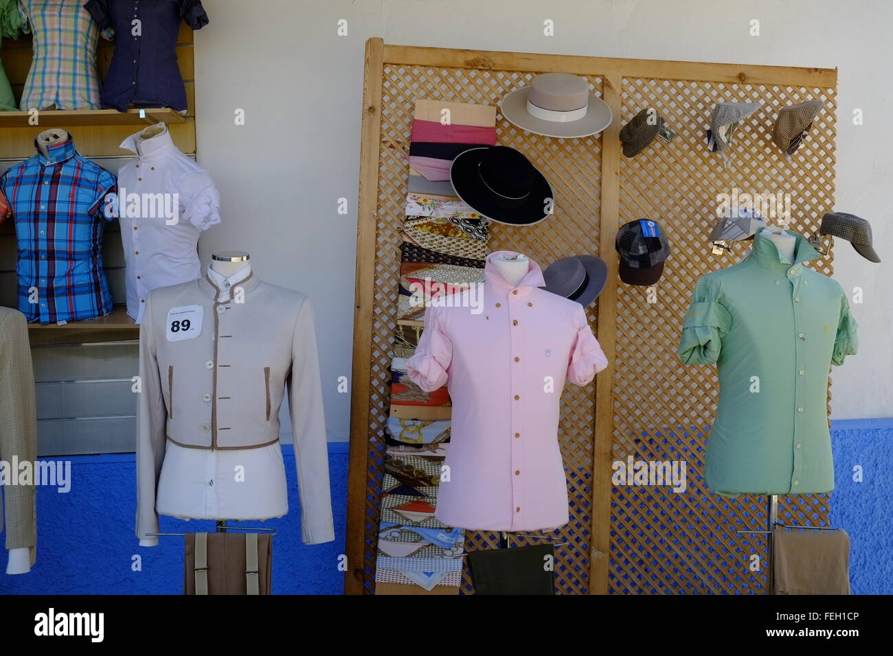 Men's traditional horse riding clothing for sale in a store fronting the road. El Rocio, Almonte. Huelva Province, Andalusia, Spain Stock Photo