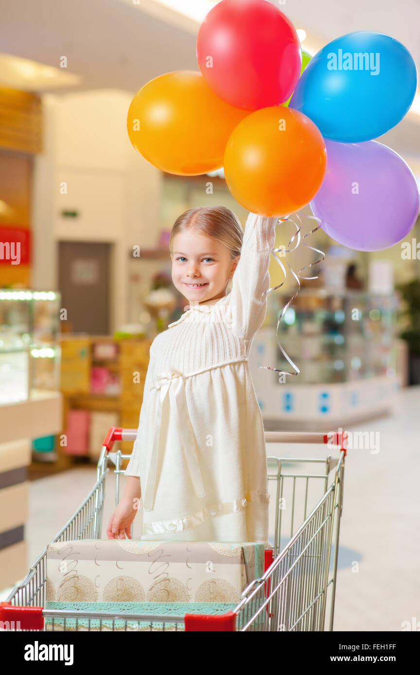 Happy child with balloons Stock Photo - Alamy