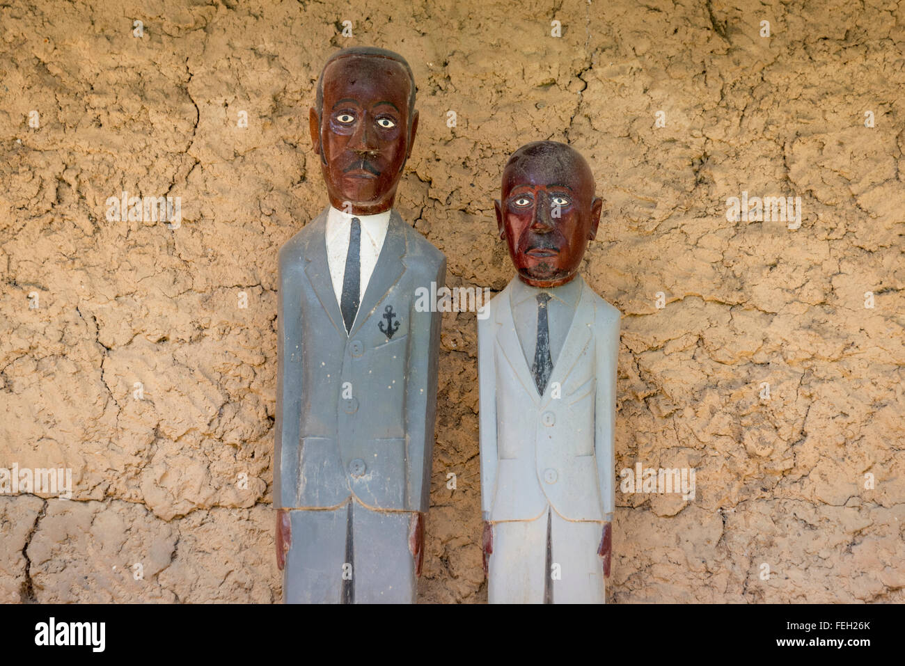 The effigies of deceased relatives at a shrine near their home in a northern Guinea Bissau village Stock Photo