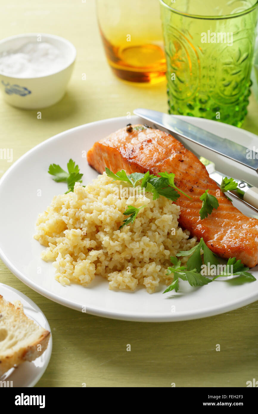 roasted salmon with side dish, food close-up Stock Photo - Alamy